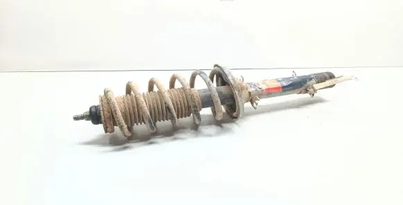 Volkswagen Golf IV Front shock absorber with coil spring