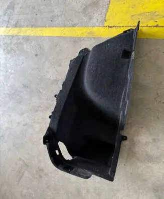 Trunk/boot lower side trim panel