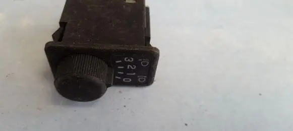 Headlight level height control switch