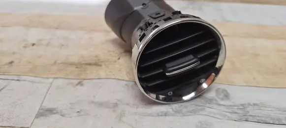 Dash center air vent grill