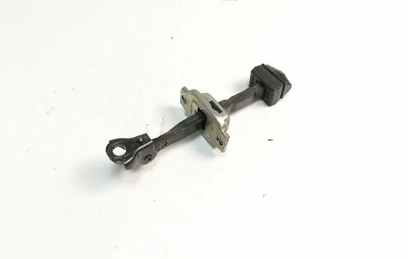 Front door check strap stopper