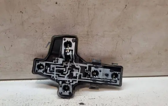 Tail light bulb cover holder