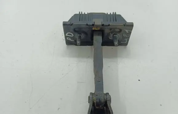 Front door check strap stopper