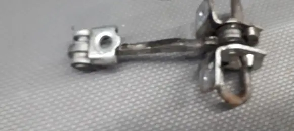 Opel Corsa C Rear door check strap stopper