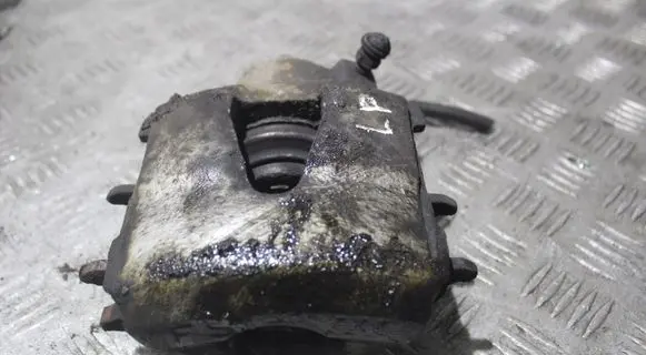 Volkswagen Polo V 6R Front brake caliper