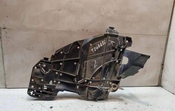 Volkswagen Touareg I Headlight/headlamp mounting bracket 16464500