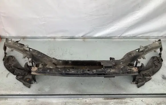 Top upper radiator support slam panel