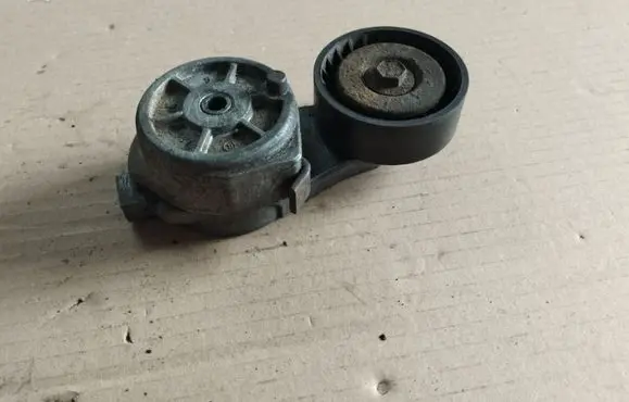Chrysler Voyager Generator/alternator belt tensioner 04861277AB