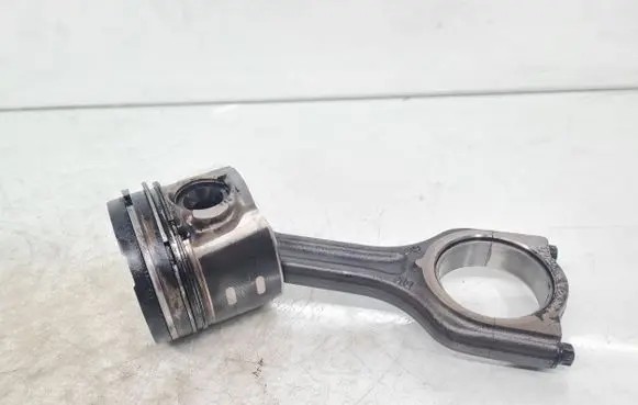 Piston with connecting rod