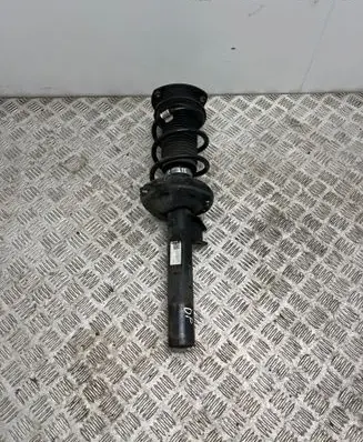 Volkswagen Golf VII Front shock absorber with coil spring 5Q0413023GR 166WWAHKH743KA