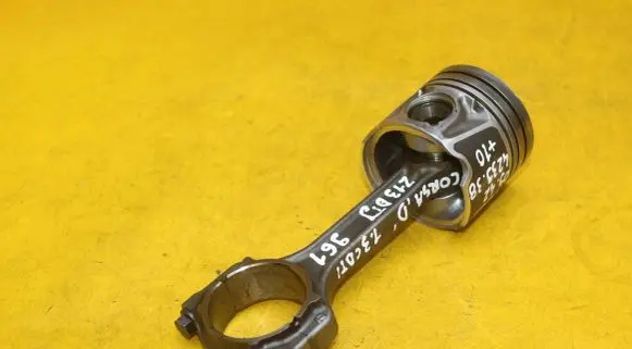 Piston with connecting rod