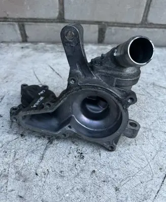 Thermostat/thermostat housing