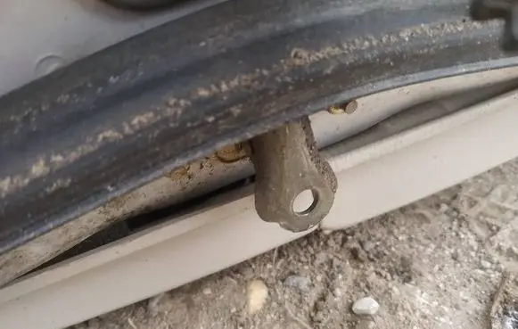 Subaru Legacy Rear door check strap stopper 