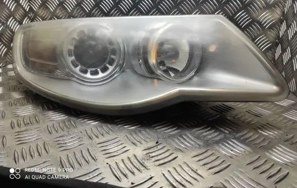 Volkswagen Touareg I Headlight/headlamp 7L6941032A 1LL24703204 24703204000074