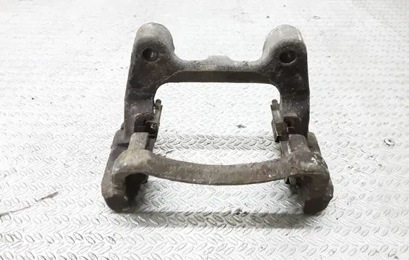 Volkswagen PASSAT B6 Brake caliper pad carrier rear 