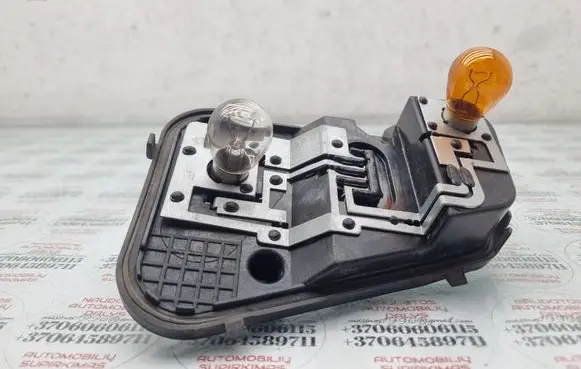 Volkswagen Touareg I Tail light bulb cover holder 7L6945258