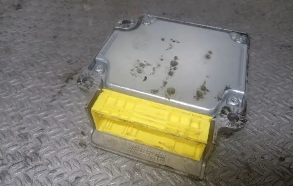 Volkswagen Touran I Airbag control unit/module 1T0909605