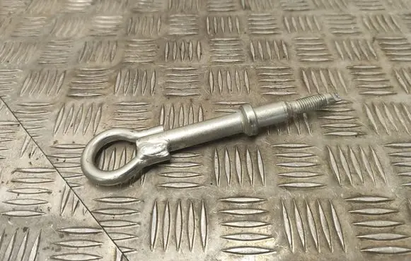 Towing hook eye