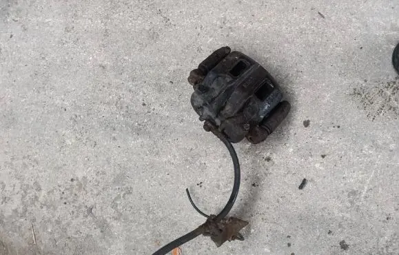 Opel Frontera B Front brake caliper
