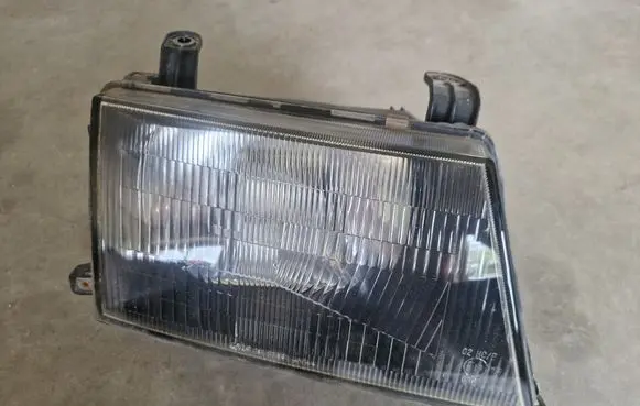 Mitsubishi Pajero Sport I Headlight/headlamp