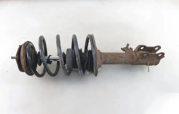 Nissan Almera N16 Front shock absorber with coil spring