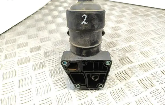 Skoda Fabia Mk2 (5J) Oil filter mounting bracket 03L117021C