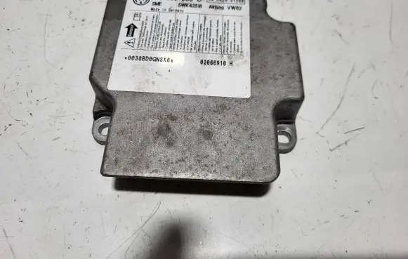 Volkswagen Touran I Airbag control unit/module 1T0909605C 02060910H 5WK43518