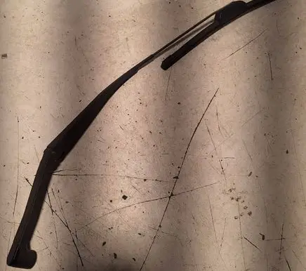 Front wiper blade arm