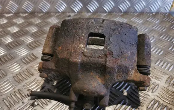 Mitsubishi Lancer X Front brake caliper