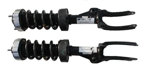 Volkswagen Touareg II Front shock absorber with coil spring 7P6413031AN 7P6413032AN