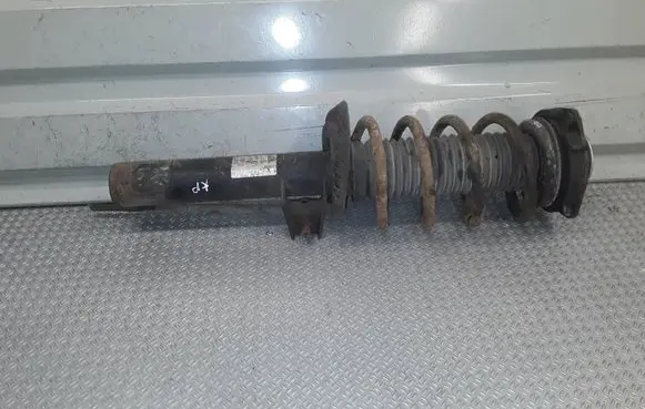 Volkswagen Caddy Front shock absorber with coil spring 