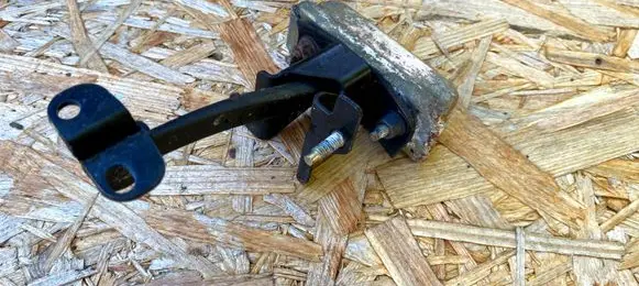 Chrysler 300M Rear door check strap stopper