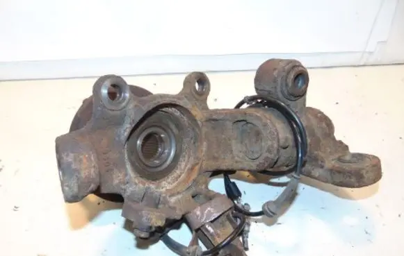 Front wheel hub spindle knuckle