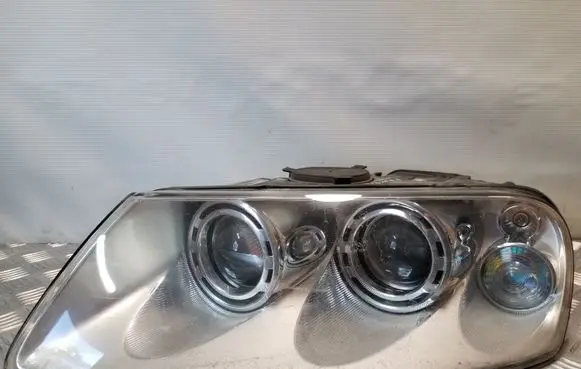 Volkswagen Touareg I Headlight/headlamp 7L6941017BG
