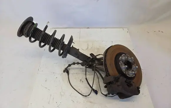 Front shock absorber with coil spring