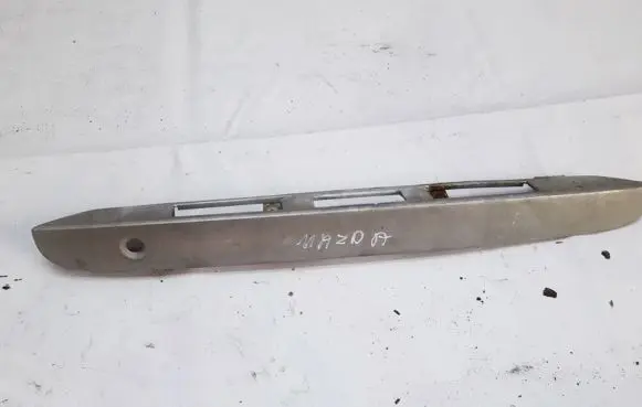 Trunk door license plate light bar