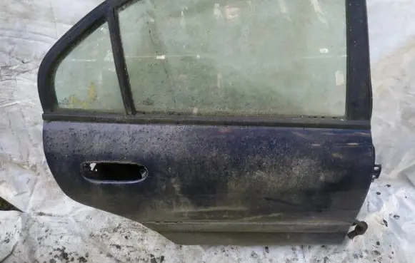 Mitsubishi Carisma Rear door MELYNOS