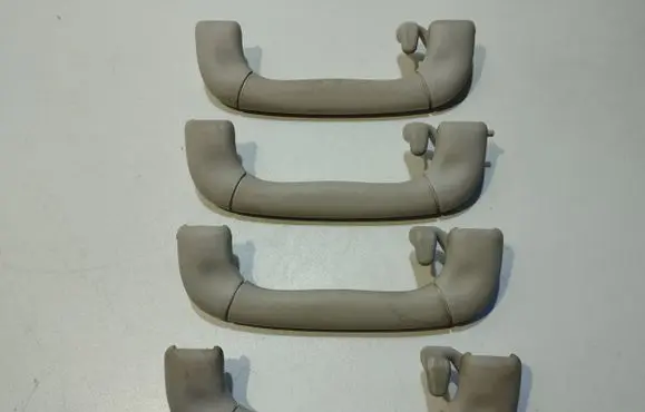 Saab 9-5 A set of handles for the ceiling 90459155 2020496