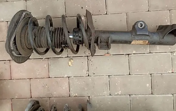 Mercedes-Benz E W212 Front shock absorber with coil spring A2123200538