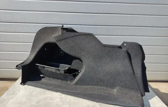 Trunk/boot lower side trim panel