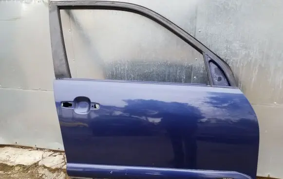 Suzuki Grand Vitara II Front door