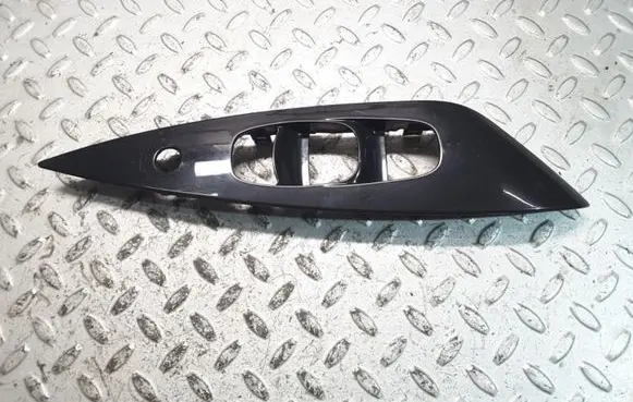 Nissan Leaf I (ZE0) Front door window switch trim 809613NA0A