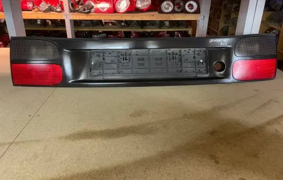 Renault Laguna I Trunk door license plate light bar 22260002 7700820049