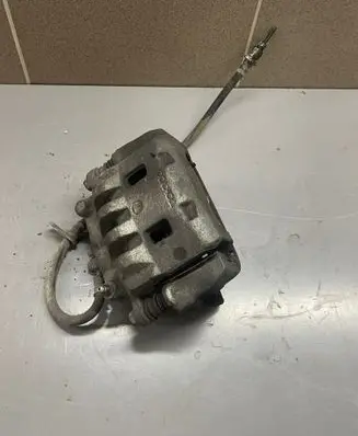 Subaru Legacy Front brake caliper 