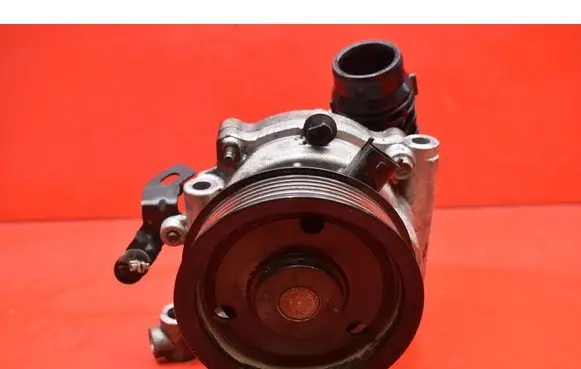 Opel Astra J Water pump 55496778