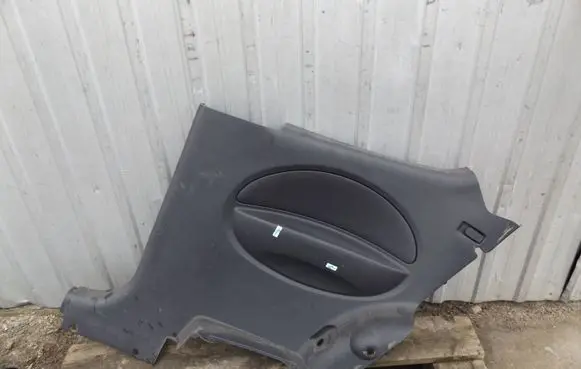 Chevrolet Aveo Coupe rear side trim panel 