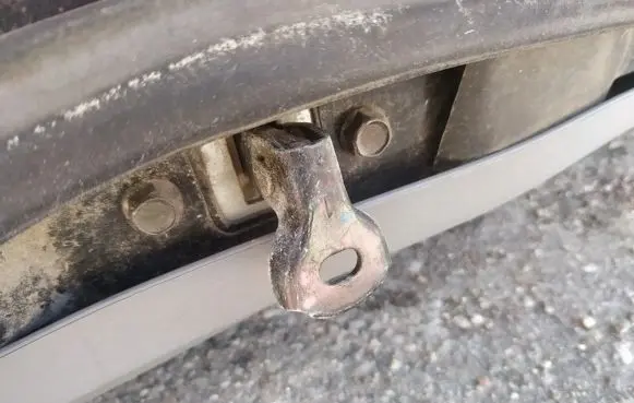 Mazda 2 Rear door check strap stopper