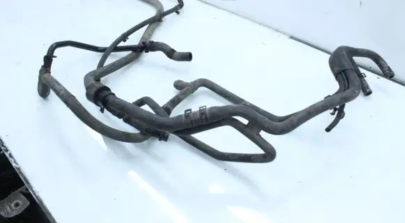 Volkswagen Touareg I Engine coolant pipe/hose