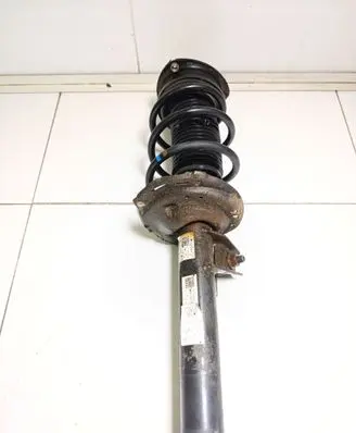 Volkswagen Golf VII Front shock absorber with coil spring 5Q0412014 5Q0413023FK