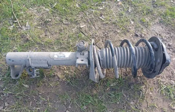 Mercedes-Benz E C207 W207 Front shock absorber with coil spring A2073207238